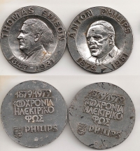 2 silver (1000) medals for 100 years of electric light Philips