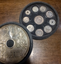 Collection of silver reproductions of various Greek coins