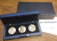 Wooden case with 3 Greek silver coins