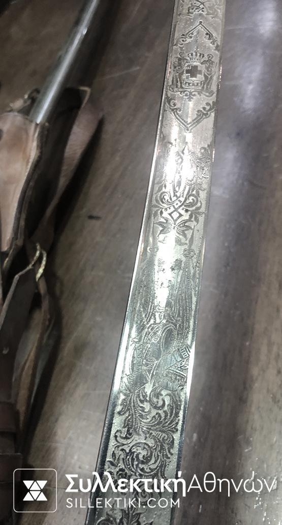 Ξίφος (προπολεμικό) μαζί με τα μετάλλια και μια απονομή Αριστείου Ανδρείας Ταγματάρχη