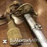 Ξίφος (προπολεμικό) μαζί με τα μετάλλια και μια απονομή Αριστείου Ανδρείας Ταγματάρχη