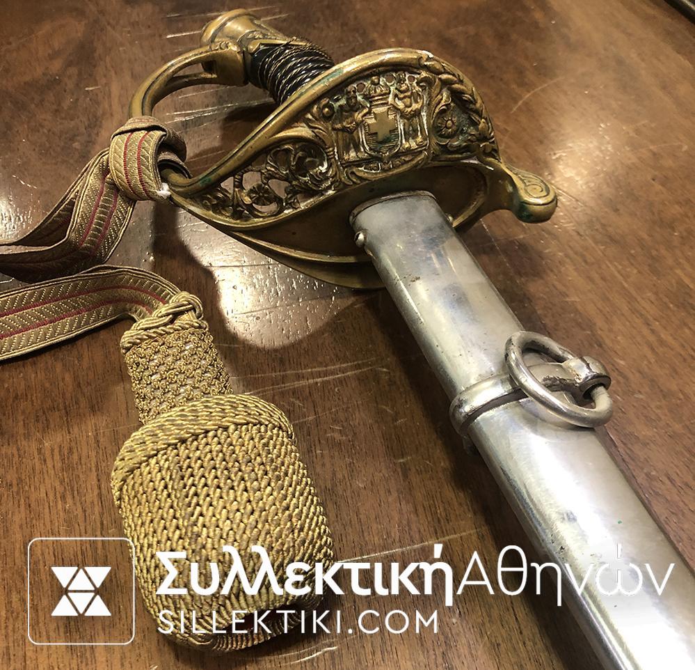 Ξίφος (προπολεμικό) μαζί με τα μετάλλια και μια απονομή Αριστείου Ανδρείας Ταγματάρχη