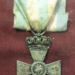 Ξίφος (προπολεμικό) μαζί με τα μετάλλια και μια απονομή Αριστείου Ανδρείας Ταγματάρχη