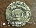 Fake bronze coin used for fraud