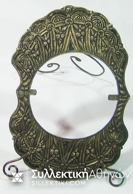 Silver-copper photo frame made out of buckle