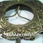 Ασημόχαλκη επιτραπέζια κορνίζα φτιαγμένη από πόρπη