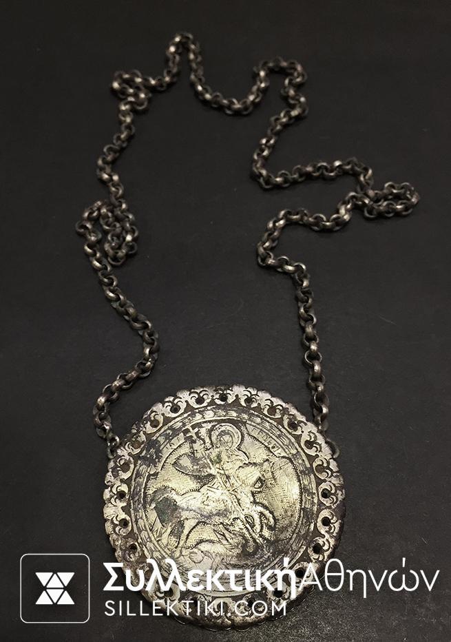 Old brass relegius item