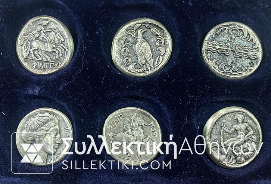 Collection of copies of Silver Ancient Olympic Coins from the company Antika with their certificate, which includes detailed information.
