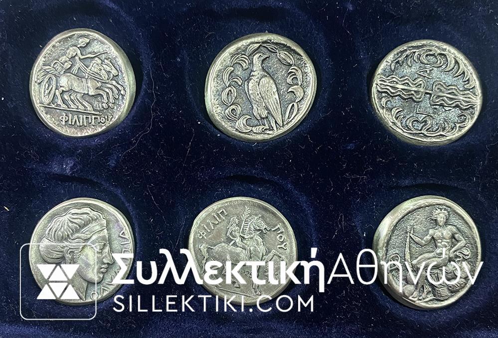 Collection of copies of Silver Ancient Olympic Coins from the company Antika with their certificate, which includes detailed information.